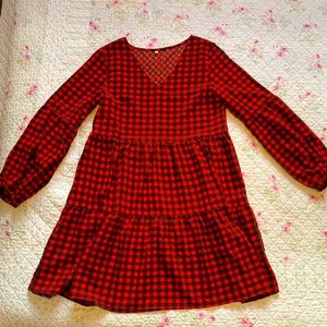 Small red and black long sleeve ruffle dress. Worn once. Super cute.
